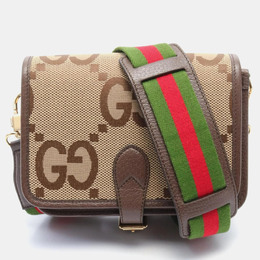 Gucci: Бежевая сумка  GG