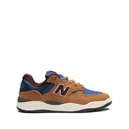 New Balance: Коричневые кроссовки  1010