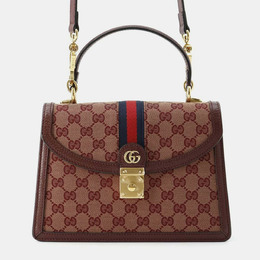 Gucci: Бордовая сумка 