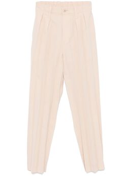 Homme Plissé Issey Miyake: Бежевые брюки 