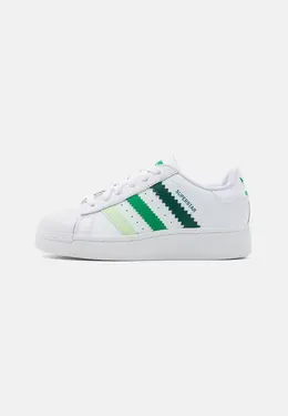 Adidas: Зелёные кеды 