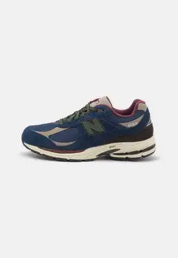 New Balance: Синие кроссовки 