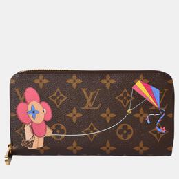 Louis Vuitton: Коричневый кошелёк  Zippy