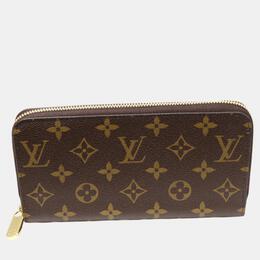 Louis Vuitton: Коричневый кошелёк  Zippy