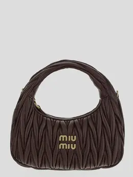 Miu Miu: Коричневая сумка 