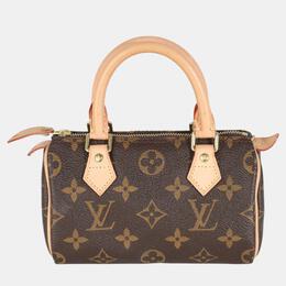 Louis Vuitton: Коричневая сумка  Speedy