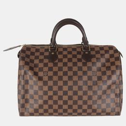 Louis Vuitton: Коричневая сумка  Speedy