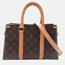 Louis Vuitton: Коричневая сумка 