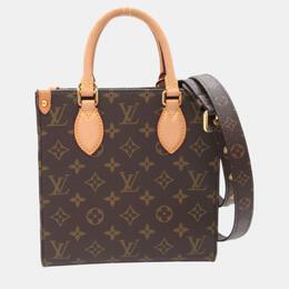 Louis Vuitton: Коричневая сумка 