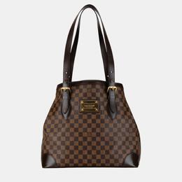 Louis Vuitton: Коричневая сумка 