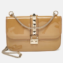 Valentino: Бежевая сумка  Rockstud