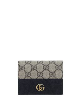 Gucci: Бежевый кошелёк  GG Marmont