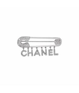 CHANEL: Брошь 