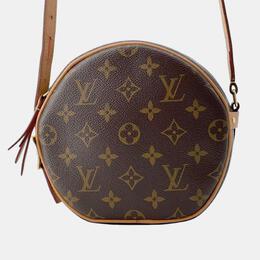 Louis Vuitton: Коричневая сумка 