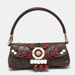Prada: Тёмная сумка 