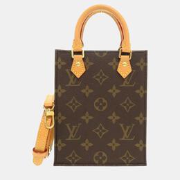 Louis Vuitton: Коричневая сумка 