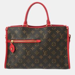 Louis Vuitton: Коричневая сумка 