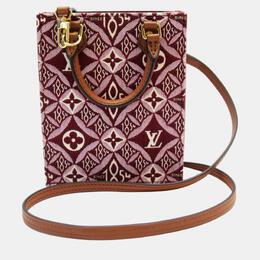 Louis Vuitton: Бордовая сумка 