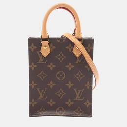 Louis Vuitton: Коричневая сумка 