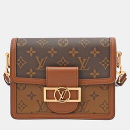 Louis Vuitton: Коричневая сумка 