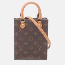 Louis Vuitton: Коричневая сумка 