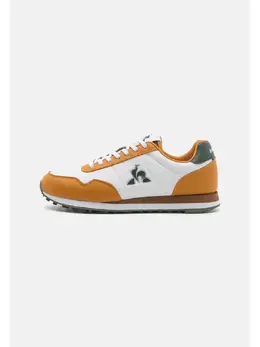 Le Coq Sportif: Жёлтые кроссовки 