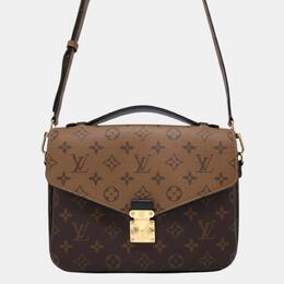 Louis Vuitton: Коричневая сумка  Pochette