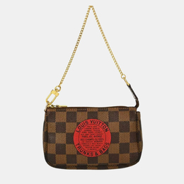 Louis Vuitton: Коричневая сумка  Pochette Accessoires