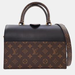 Louis Vuitton: Коричневая сумка  Speedy