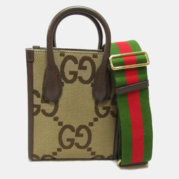 Gucci: Коричневая сумка  GG