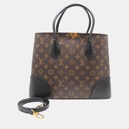 Louis Vuitton: Коричневая сумка 