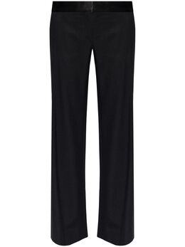 Victoria Beckham: Чёрные брюки 
