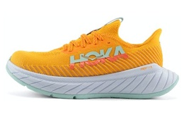 Hoka One One: Жёлтые кроссовки 