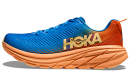 Hoka One One: Оранжевые кроссовки 