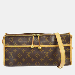 Louis Vuitton: Коричневая сумка 