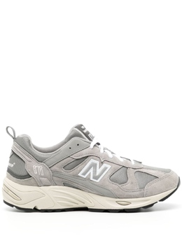 New Balance: Серые кроссовки 