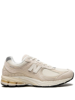 New Balance: Бежевые кроссовки  2002R