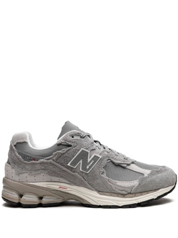 New Balance: Серые кроссовки 