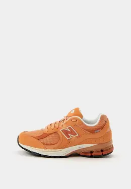 New Balance: Оранжевые кроссовки 