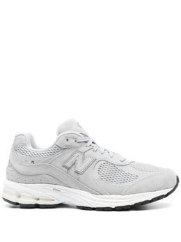 New Balance: Серые кроссовки 