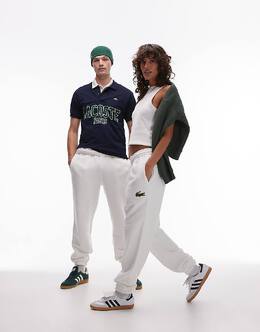 Lacoste: Белые брюки 