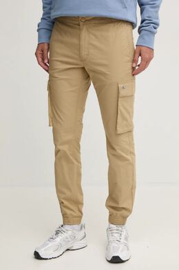 Calvin Klein Jeans: Бежевые брюки 