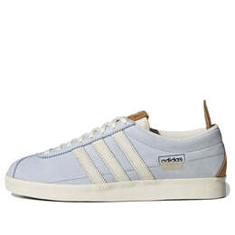 Adidas: Серые кроссовки 