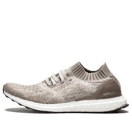 Adidas: Коричневые кроссовки  UltraBoost Uncaged