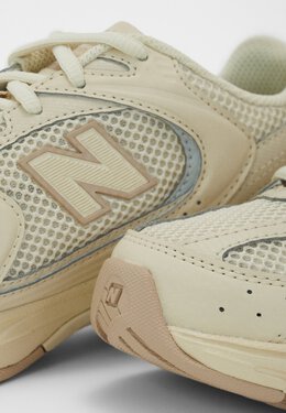 New Balance: Бежевые кроссовки  530