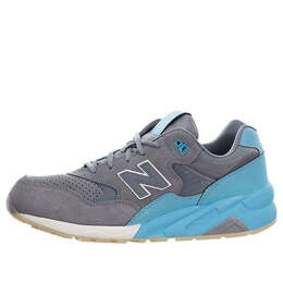 New Balance: Серые кроссовки 