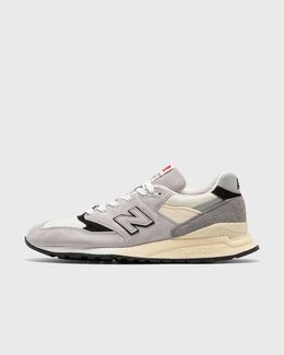 New Balance: Серые кроссовки 