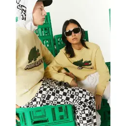 LACOSTE: Жёлтый свитшот 