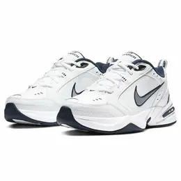 NIKE: Белые кроссовки  Air Monarch IV