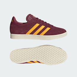 Adidas: Жёлтые кроссовки  Gazelle